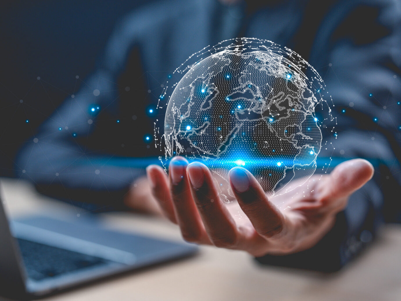 Big Data Analytics And Business Intelligence Concept. Businessman Holding Global