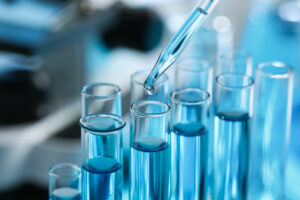 Test tubes with fluid in them