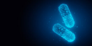 Two blue glowing low-poly wireframe pills 3d rendering